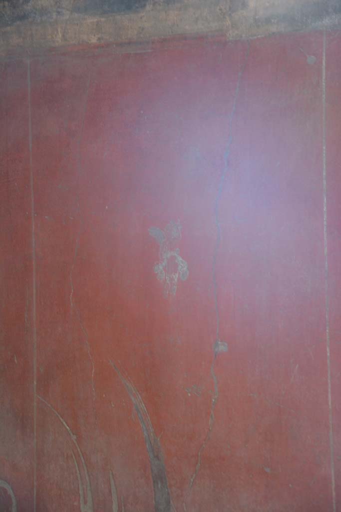 I.6.15 Pompeii. March 2019. 
Room 13, flying figure in centre of red panel at east end of south wall.        
Foto Annette Haug, ERC Grant 681269 DÉCOR