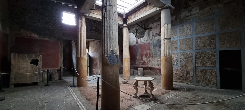 I.6.15 Pompeii. December 2023. 
Room 4, looking south across impluvium in atrium towards entrance corridor, in centre. Photo courtesy of Miriam Colomer.
