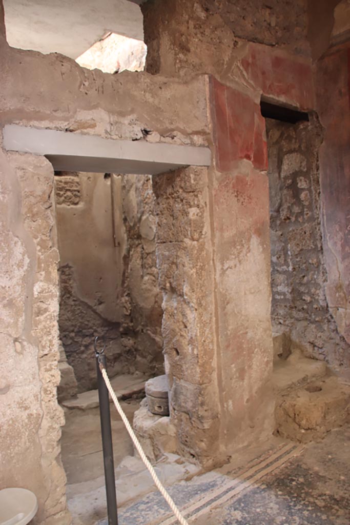I.6.15 Pompeii. October 2023. 
Room 1, looking south through doorway, with stairs to upper floor, on right. Photo courtesy of Klaus Heese.
