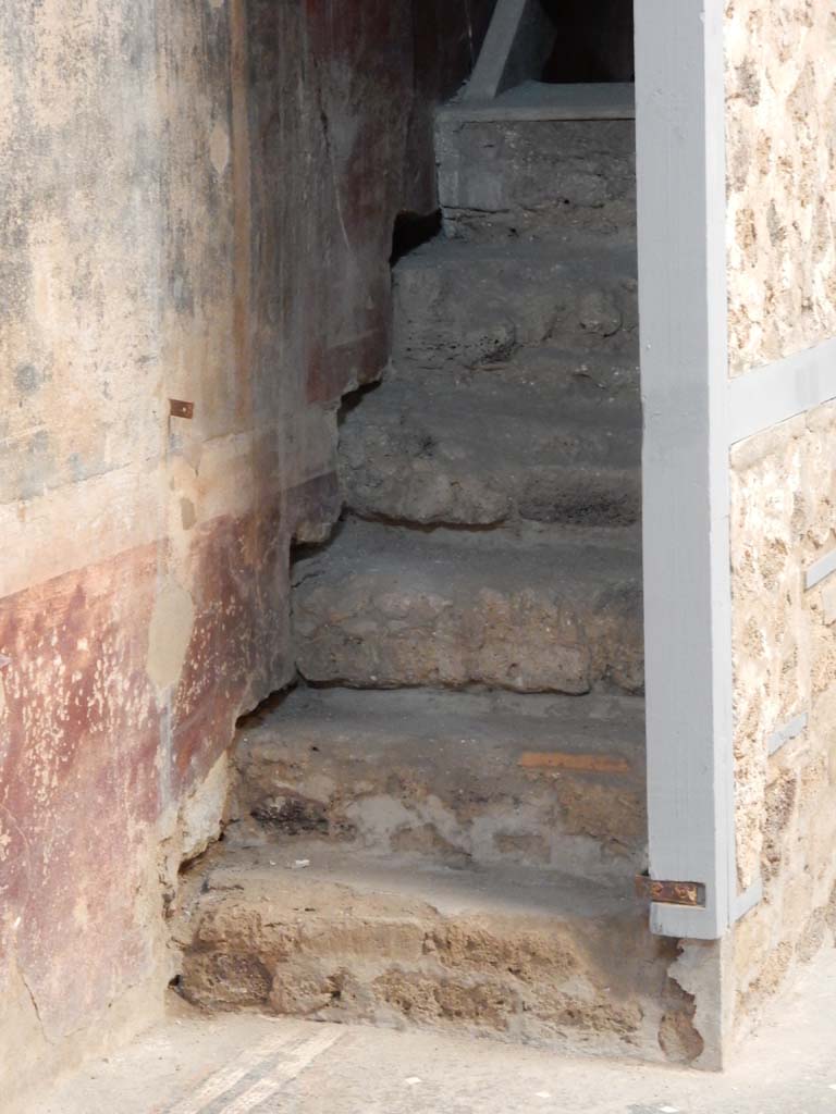 I.6.15 Pompeii. June 2019. Room 3, detail of lower stairs and reconstructed modern wooden stairs, above. 
Photo courtesy of Buzz Ferebee.
