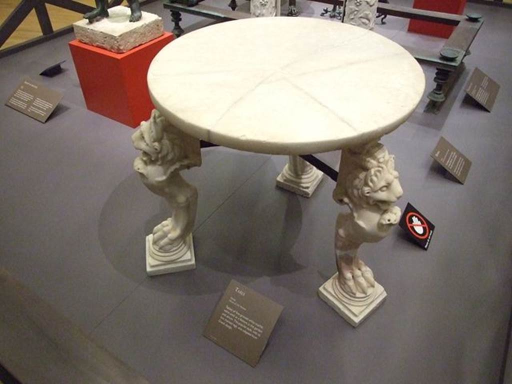 I.6.15 Pompeii. Room 4, marble table with lion legs in atrium. Found on centre of north side of impluvium. SAP inventory number 20530.
Photographed at “A Day in Pompeii” exhibition at Melbourne Museum. September 2009.