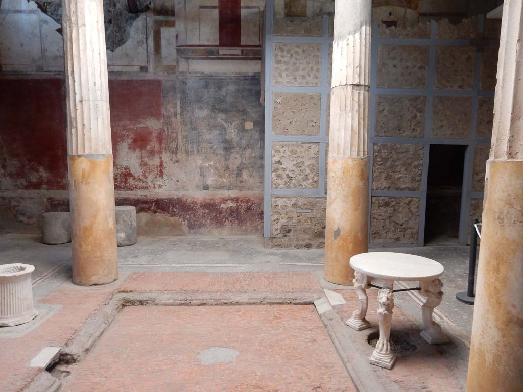 I.6.15 Pompeii. June 2019. Room 4, looking west across impluvium in atrium.
Photo courtesy of Buzz Ferebee.