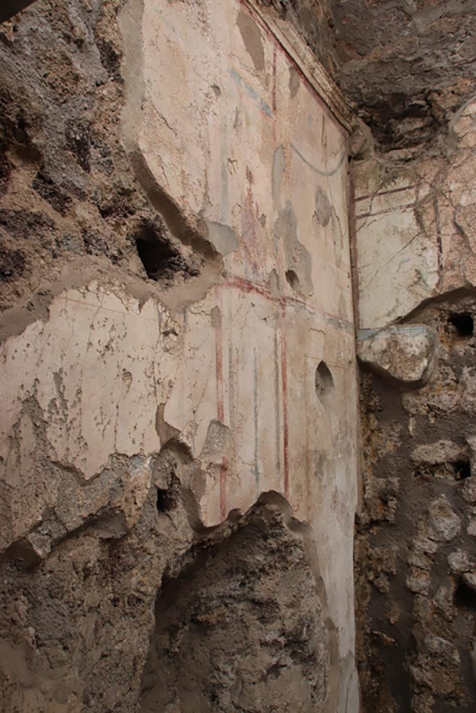 I.6.15 Pompeii. October 2023. 
Room 8, south wall and upper south-west corner. Photo courtesy of Klaus Heese.