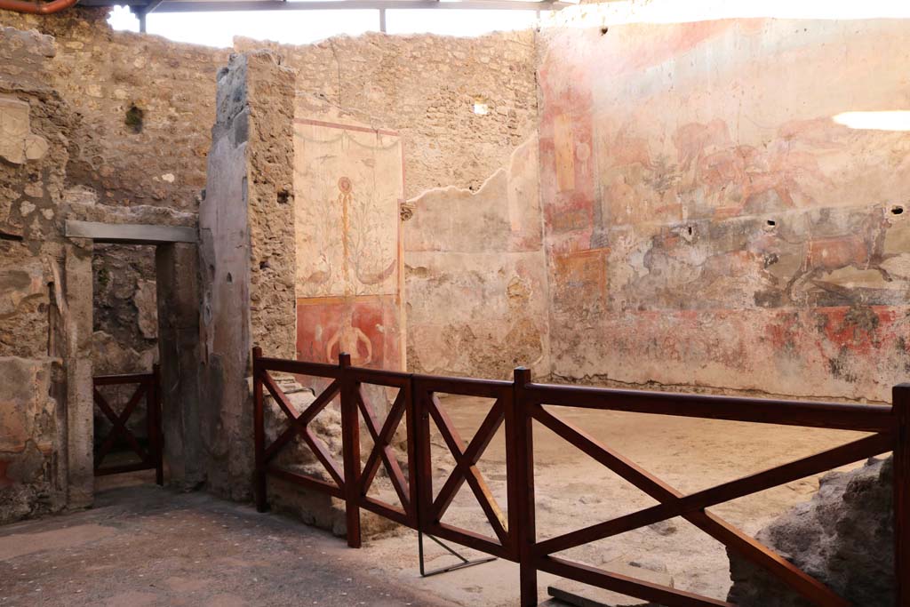 I.6.15 Pompeii. December 2018. 
Looking north-west towards room 9, the small garden. On the left is the doorway to room 8. Photo courtesy of Aude Durand.