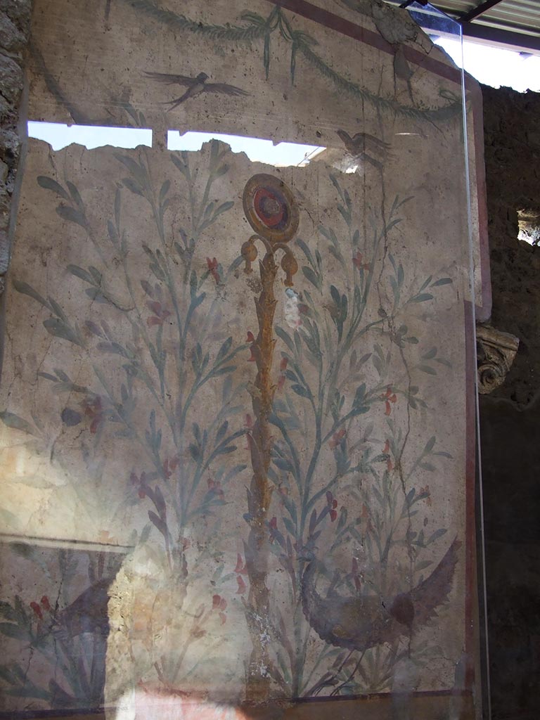 I.6.15 Pompeii. December 2007. 
Room 9, small garden. Wall on west side, picture with birds, plants and a medallion.