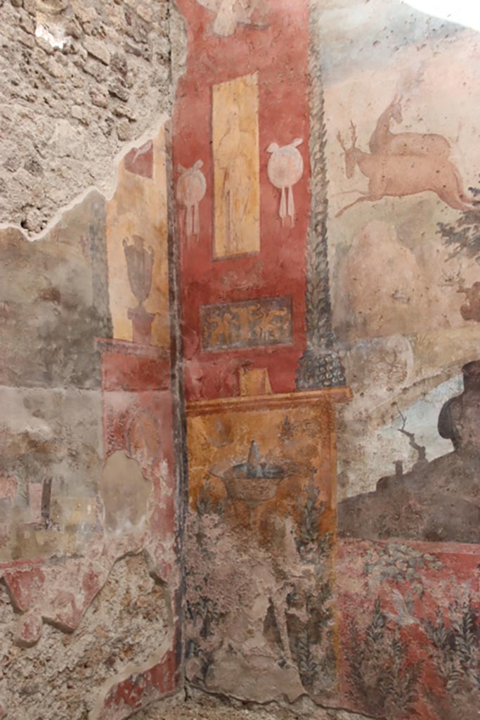 I.6.15 Pompeii. October 2023. 
Room 9, detail from north wall in north-west corner. Photo courtesy of Klaus Heese.