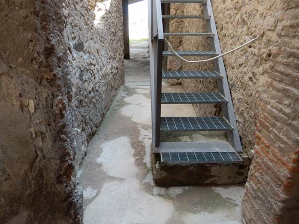 I.7.1 Pompeii. May 2016. Area of steps to upper floor in south-west corner of atrium. 
Photo courtesy of Buzz Ferebee.