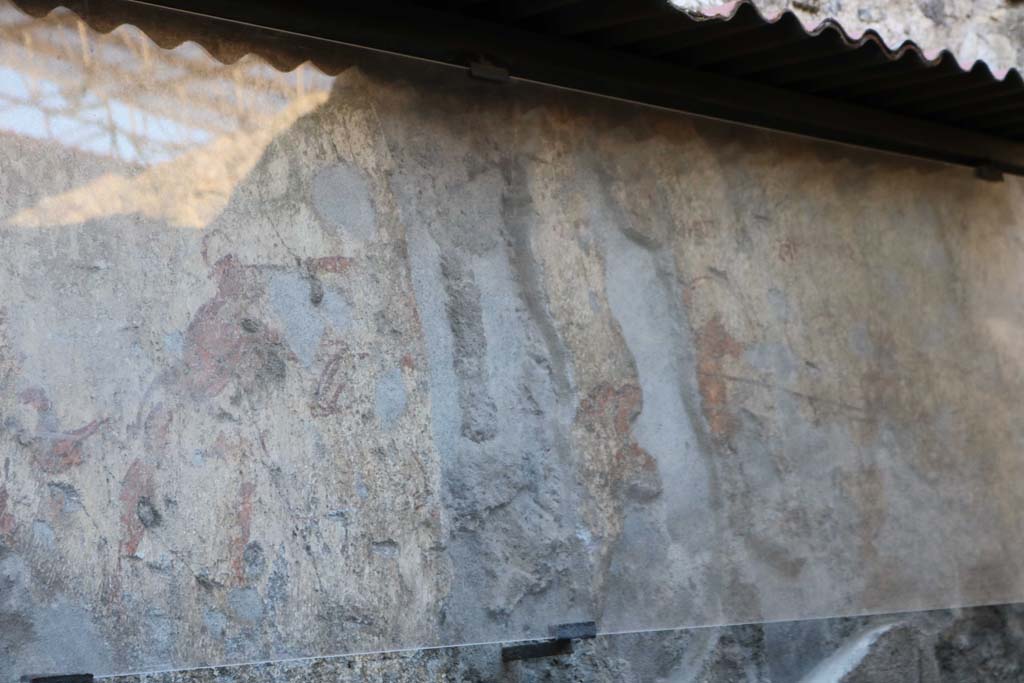 I.7.7 Pompeii. December 2018. Detail from left and right end of ancient combat wall painting. Photo courtesy of Aude Durand.