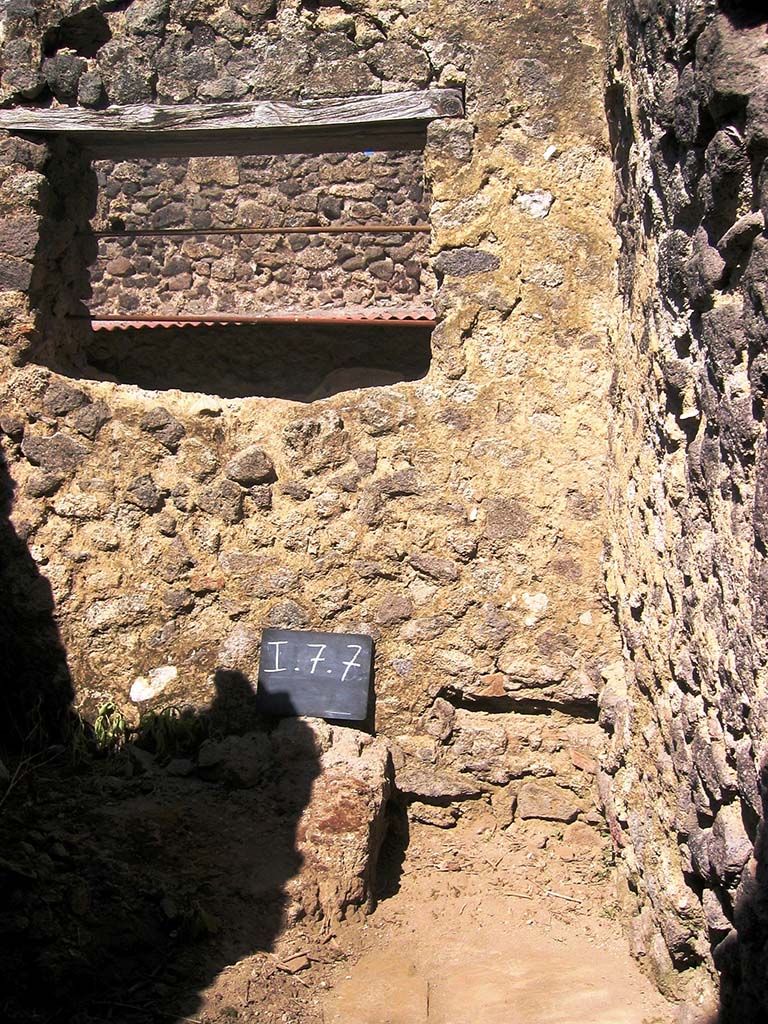 I.7.7 Pompeii. July 2007. 
Looking east towards latrine in small room on east side of entrance. Photo courtesy of Barry Hobson.