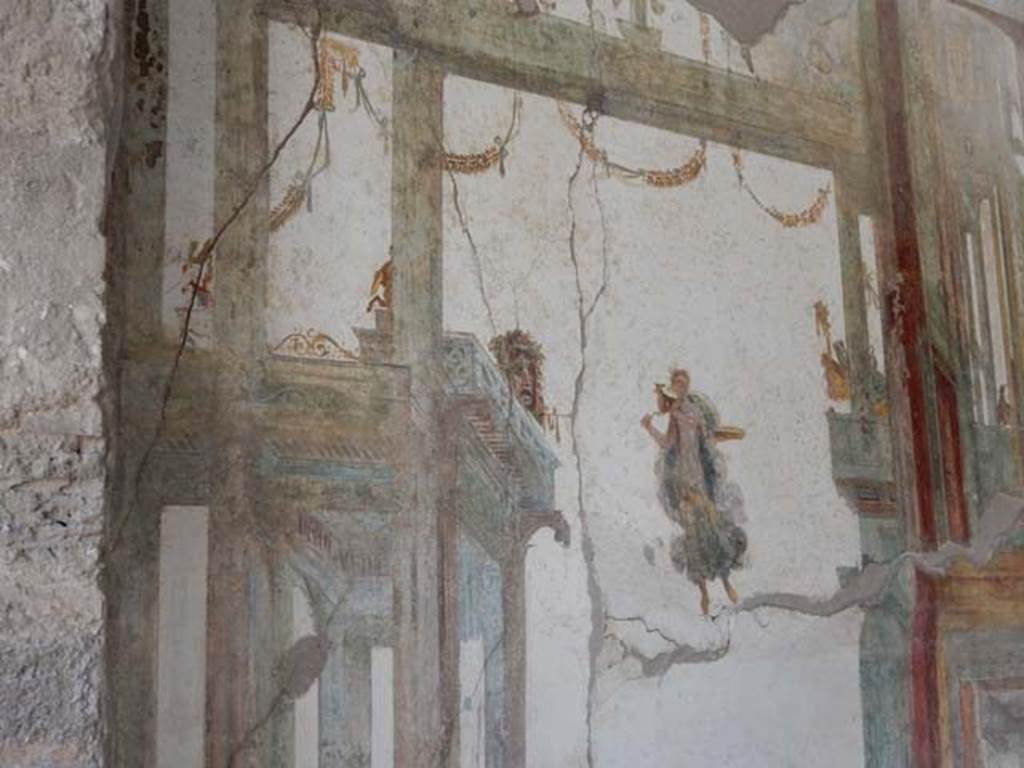 I.7.11 Pompeii. May 2017. Detail of painted decoration from south end of west wall. Photo courtesy of Buzz Ferebee.