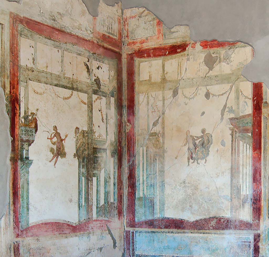 I.7.11 Pompeii. October 2018.
Great triclinium. Fresco in fourth style, detail of painted panels in north-west corner. Photo courtesy of Davide Peluso.