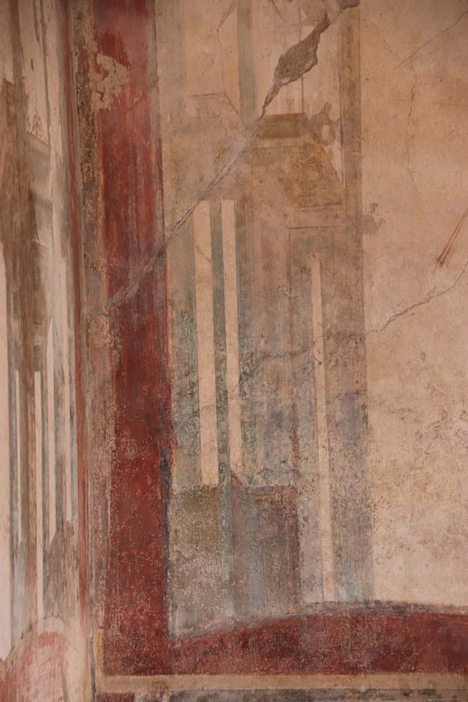 I.7.11 Pompeii. September 2021. 
Detail of painted decoration from west end of north wall. Photo courtesy of Klaus Heese.