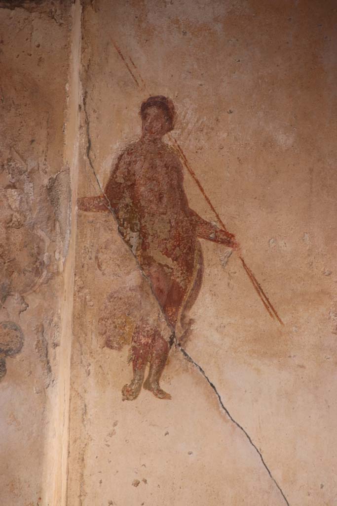 I.7.11 Pompeii. September 2021. 
Detail of second figure from panel at east end of north wall of triclinium. Photo courtesy of Klaus Heese.