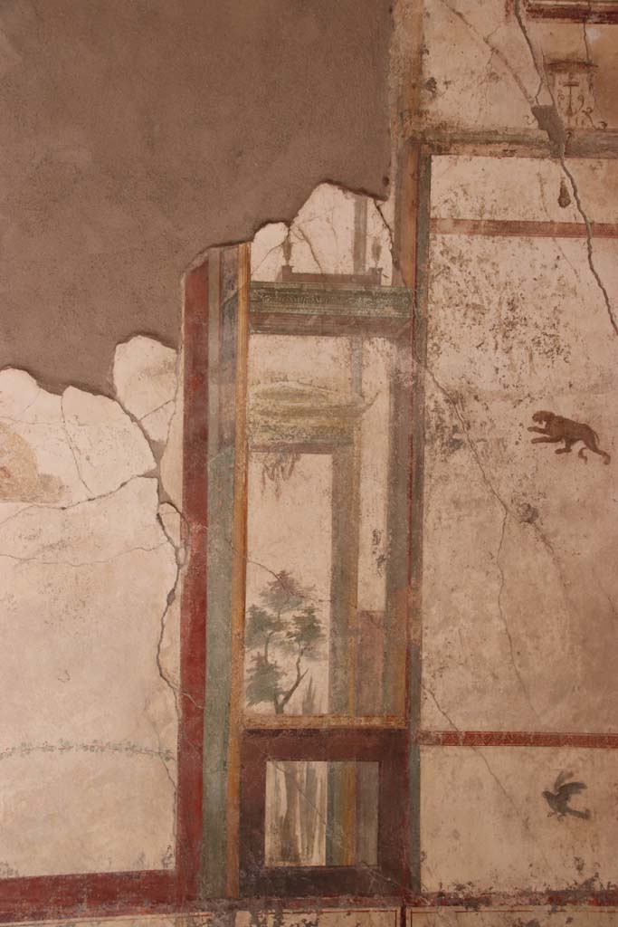 I.7.11 Pompeii. September 2021. 
East wall of exedra, detail from south side of middle panel. Photo courtesy of Klaus Heese.