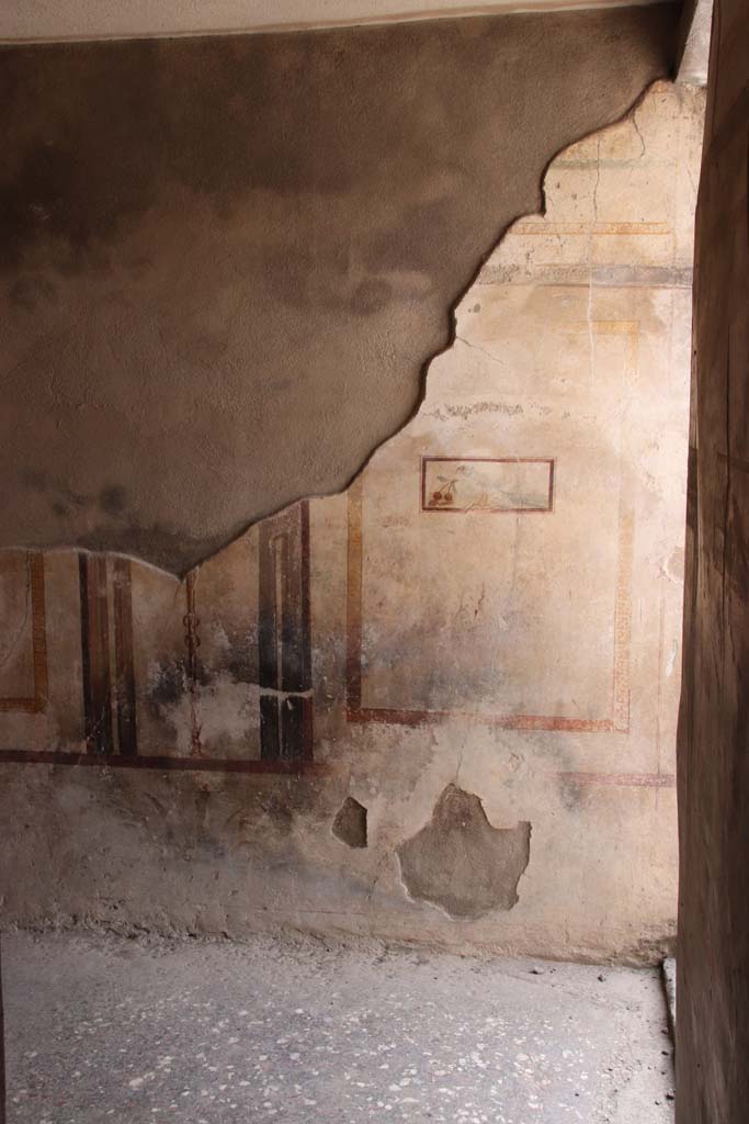 I.7.11 Pompeii. September 2021.  
Looking towards north end of west wall of cubiculum to south-east side of atrium. Photo courtesy of Klaus Heese.