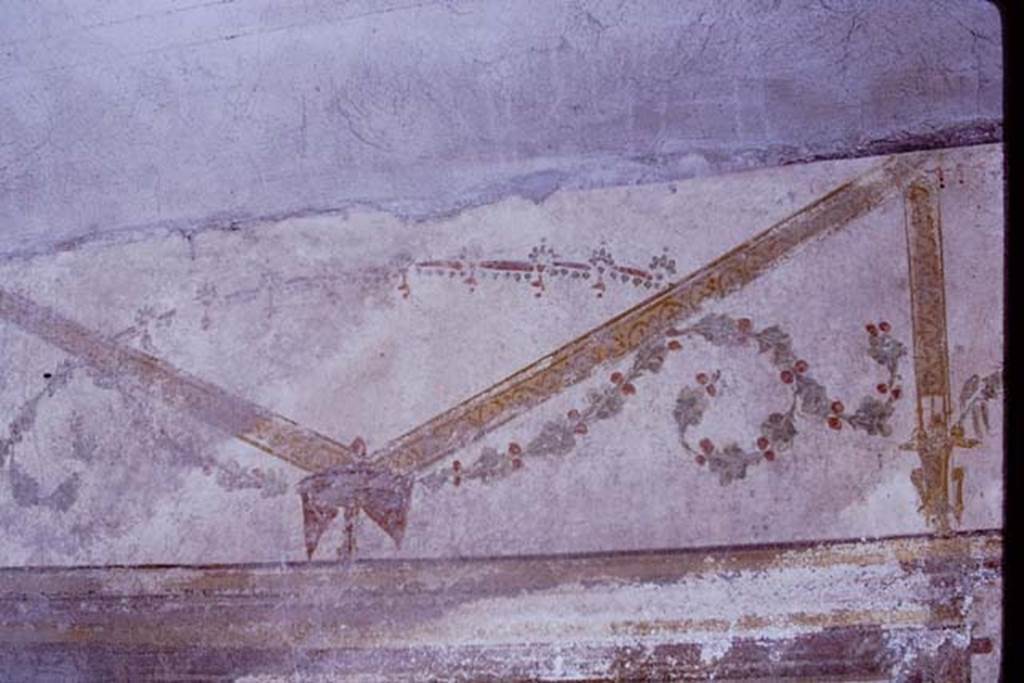 I.7.11 Pompeii, 1968.  Painted decoration from upper north wall. Photo by Stanley A. Jashemski.
Source: The Wilhelmina and Stanley A. Jashemski archive in the University of Maryland Library, Special Collections (See collection page) and made available under the Creative Commons Attribution-Non Commercial License v.4. See Licence and use details.
J68f0424