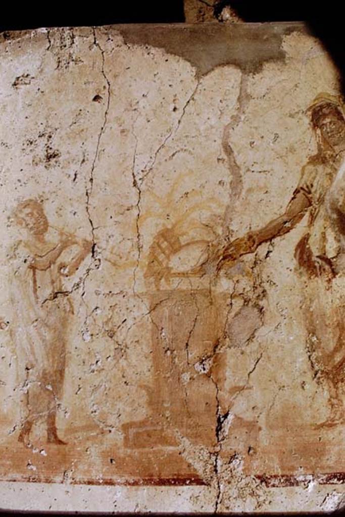 I.7.11 Pompeii. 1968. Detail from sacrificial scene on Lararium on east side of atrium belonging to original house I.7.10. Photo by Stanley A. Jashemski.
Source: The Wilhelmina and Stanley A. Jashemski archive in the University of Maryland Library, Special Collections (See collection page) and made available under the Creative Commons Attribution-Non Commercial License v.4. See Licence and use details.
J68f0063