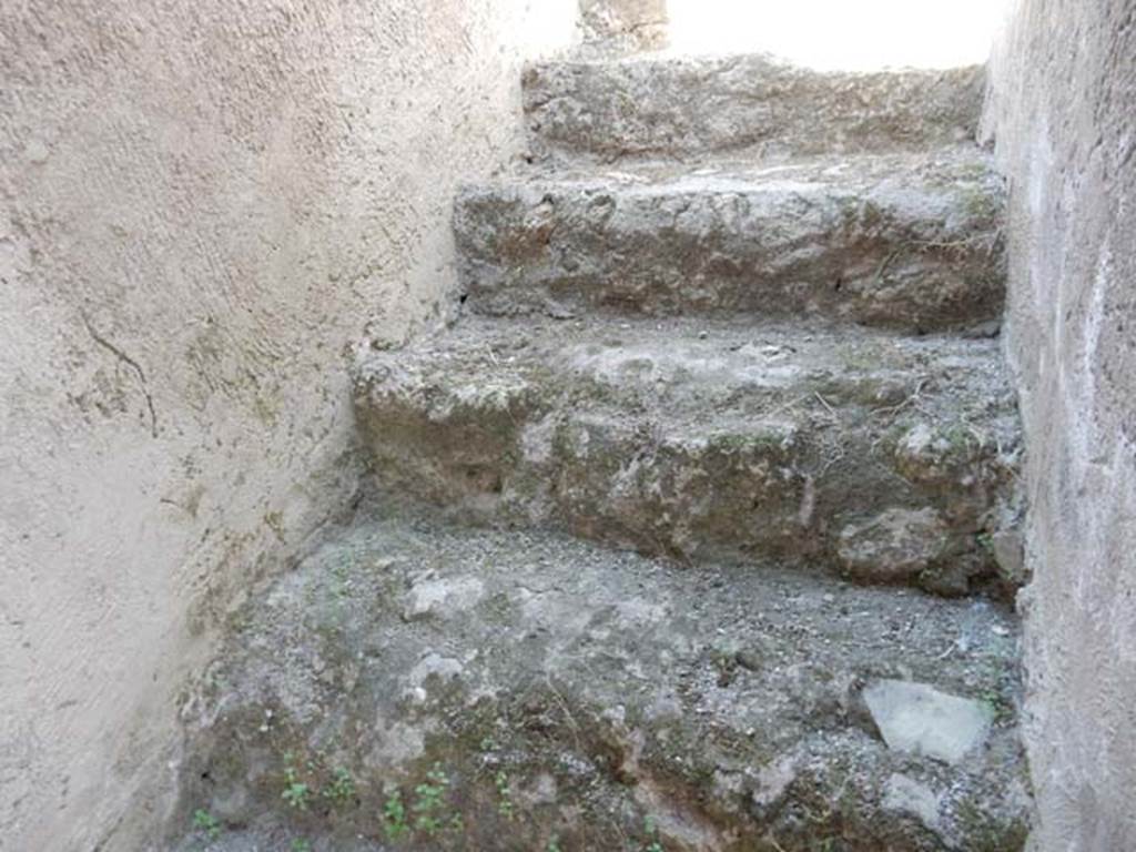 I.7.11 Pompeii. May 2017. Stairs to the upper floor, on the north wall in I.7.10. Photo courtesy of Buzz Ferebee.