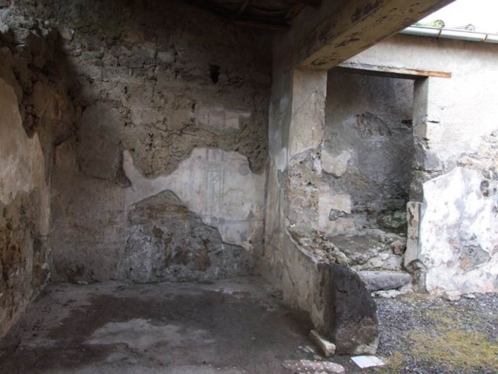 I.7.11 Pompeii. December 2006. North wall of tablinum, and north wall of atrium with stairs.  Looking north.  According to PPP, the central wall painting of the north wall was Andromeda and Perseus.  Nothing is visible now.  See Bragantini, de Vos, Badoni, 1981. Pitture e Pavimenti di Pompei, Parte 1. Rome: ICCD. (p.62, no. 107110403)
