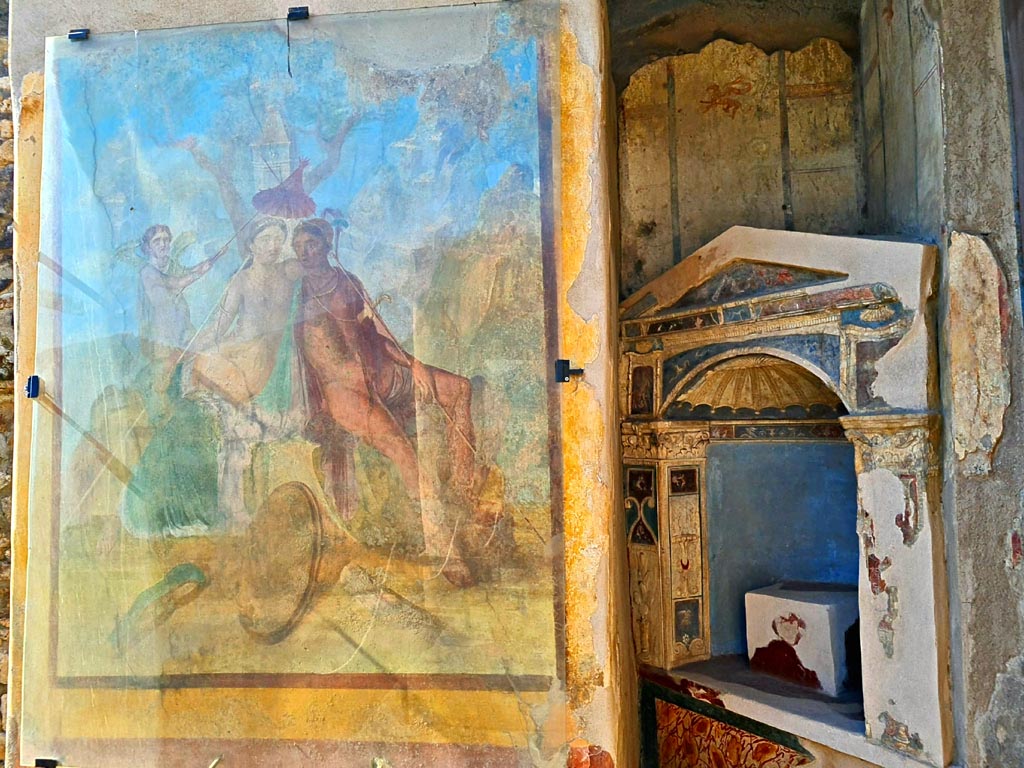 I.7.12 Pompeii. March 2024. 
West wall of north portico, with painting of Mars and Venus, and arched niche. Photo courtesy of Giuseppe Ciaramella.