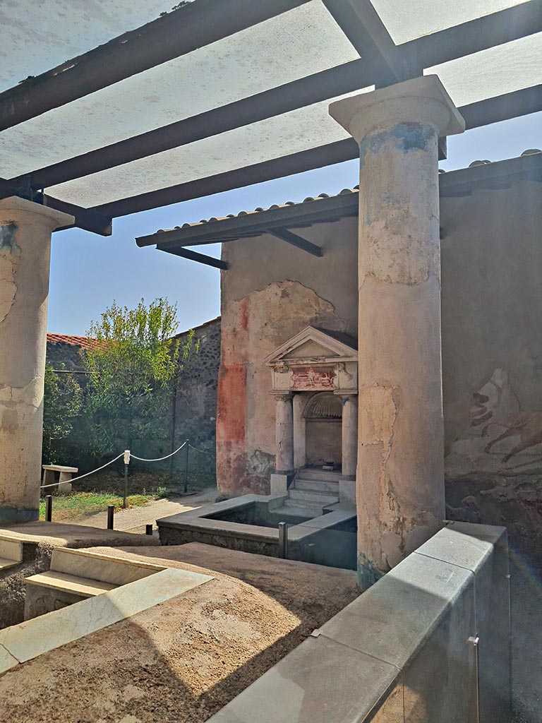 I.7.12 Pompeii. September 2024. 
Looking south-east across triclinium towards south wall. Photo courtesy of Giuseppe Ciaramella.