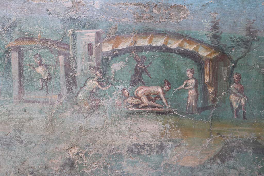 I.7.12 Pompeii. December 2018. 
Viridarium, painted erotic fresco on north end of west side of summer triclinium. Photo courtesy of Aude Durand.