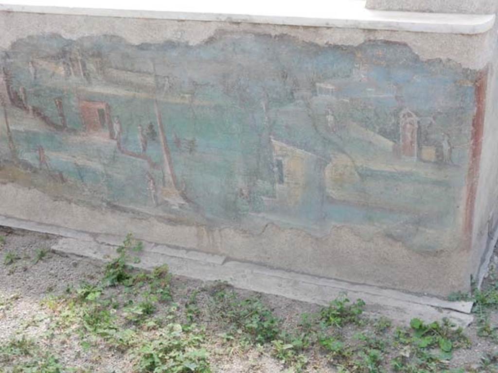 I.7.12 Pompeii. May 2017. Detail from painted panel on inside of west side of summer triclinium at north end. Photo courtesy of Buzz Ferebee.
