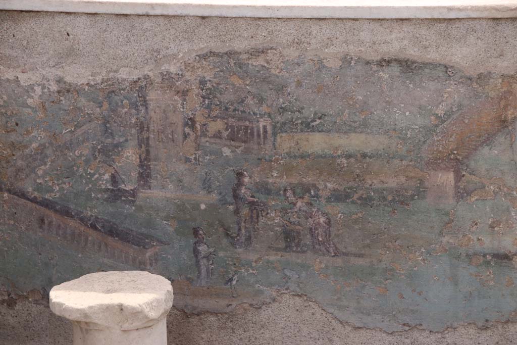 I.7.12 Pompeii. September 2021. 
Detail of painted panel on inside of south end of the west side of summer triclinium. Photo courtesy of Klaus Heese.