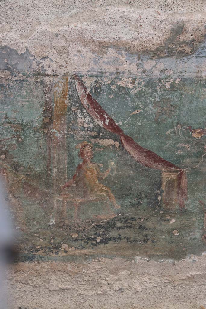 I.7.12 Pompeii. September 2021. 
Detail from painted panel at north end of east side of summer triclinium. Photo courtesy of Klaus Heese.
