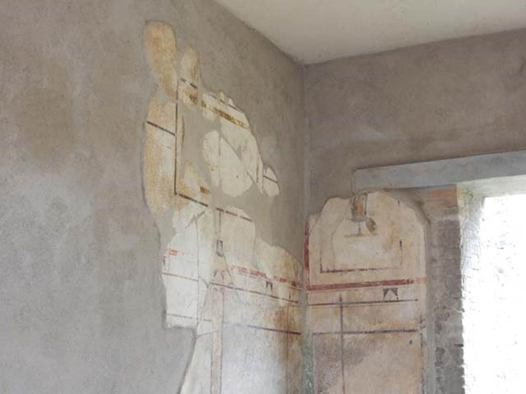 I.7.18 Pompeii. May 2017. Detail of painted plaster from north-east corner of entrance room. Photo courtesy of Buzz Ferebee.
