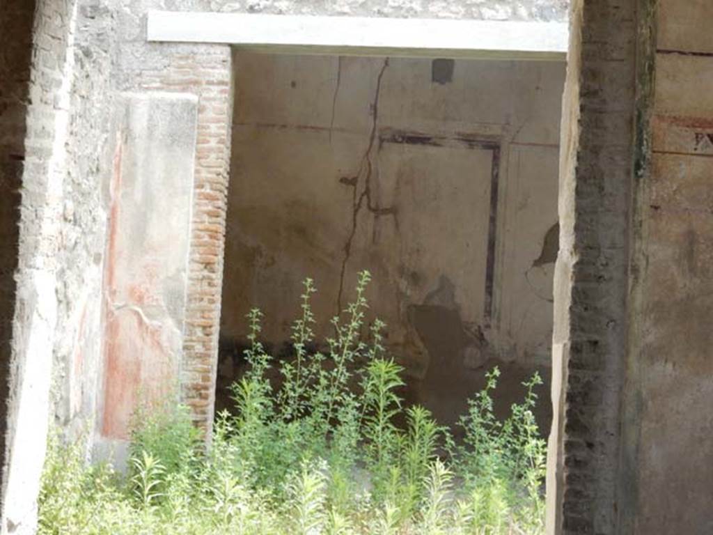 I.7.18 Pompeii. May 2017. Looking east across atrium towards doorway to tablinum.
Photo courtesy of Buzz Ferebee.