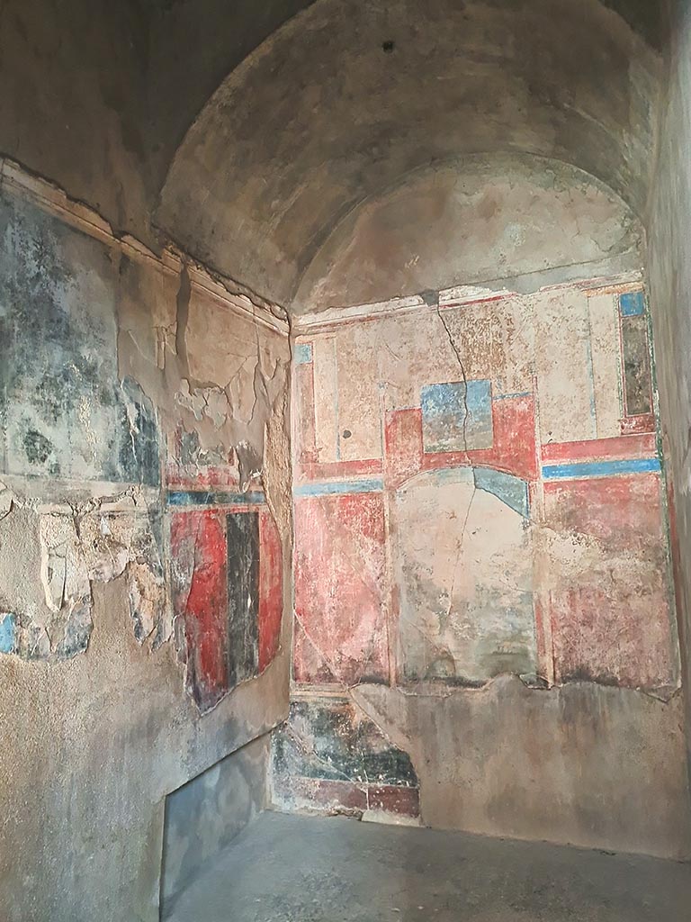 I.7.19 Pompeii. September 2024. 
Looking towards bed recess in north-east corner and east wall of cubiculum. Photo courtesy of Giuseppe Ciaramella.