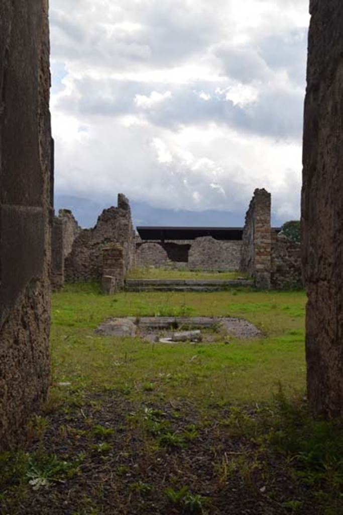 I.8.2 Pompeii. November 2014. Looking south from entrance corridor across atrium towards tablinum.  Photo courtesy of Marie Schulze.