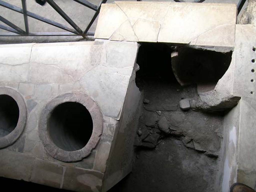 I.8.8 Pompeii. May 2003. Looking down from above counter, at north end in north-east corner. Photo courtesy of Nicolas Monteix.