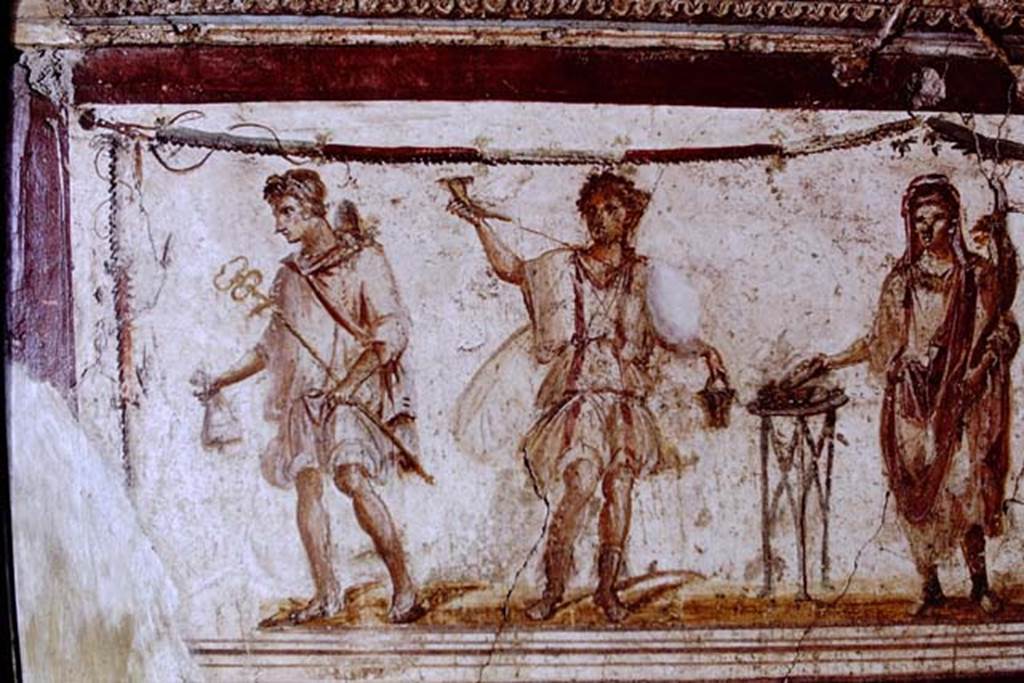 I.8.8 Pompeii. 1968. Detail from lararium on south wall.  Photo by Stanley A. Jashemski.
Source: The Wilhelmina and Stanley A. Jashemski archive in the University of Maryland Library, Special Collections (See collection page) and made available under the Creative Commons Attribution-Non Commercial License v.4. See Licence and use details.
J68f0641
