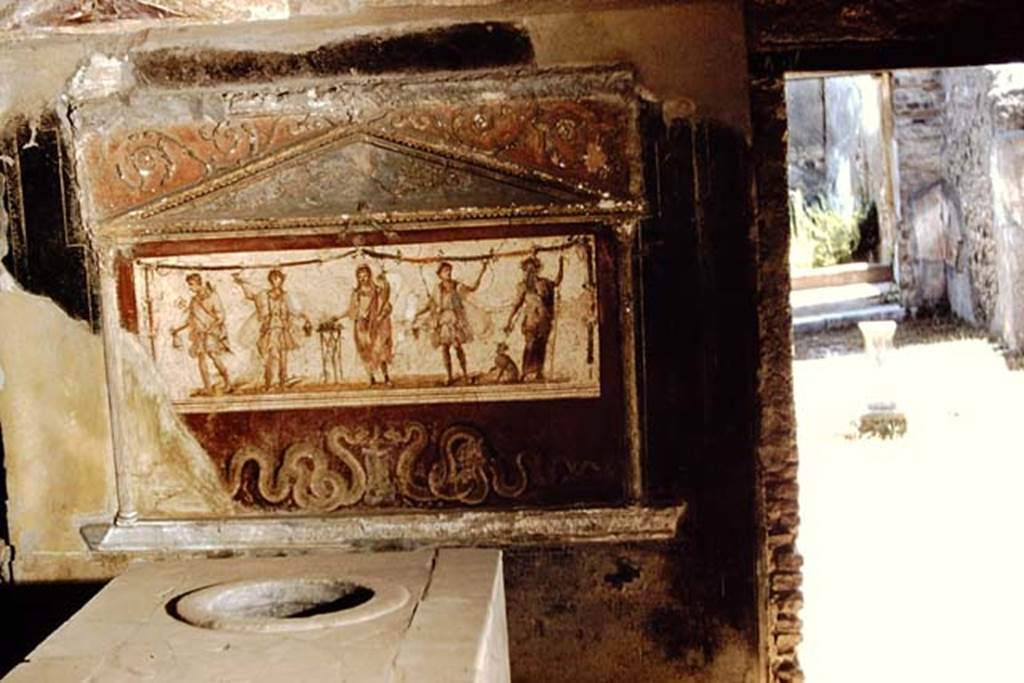 I.8.8 Pompeii. 1959. Lararium on south wall.  Photo by Stanley A. Jashemski.
Source: The Wilhelmina and Stanley A. Jashemski archive in the University of Maryland Library, Special Collections (See collection page) and made available under the Creative Commons Attribution-Non Commercial License v.4. See Licence and use details.
J59f0478