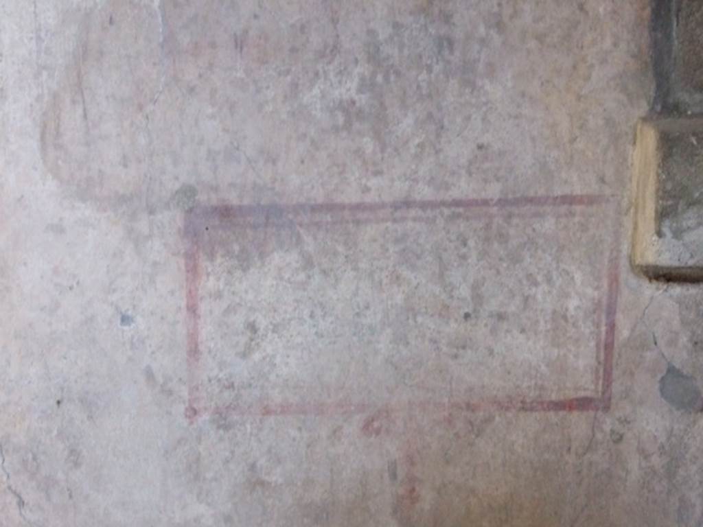 I.8.9 Pompeii. March 2009. Room 4, remains of painted panel of a bird from the north wall.