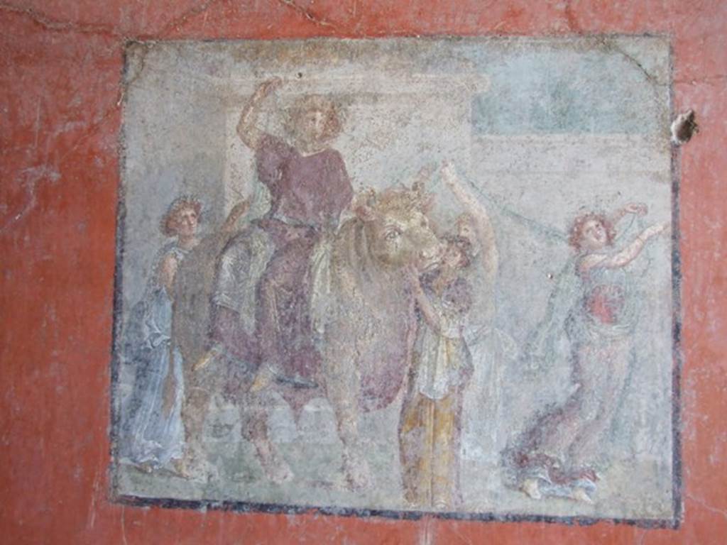 I.8.9 Pompeii. March 2009. Room 7, triclinium. Central panel on east wall.  
Wall painting of Europa and the Bull.