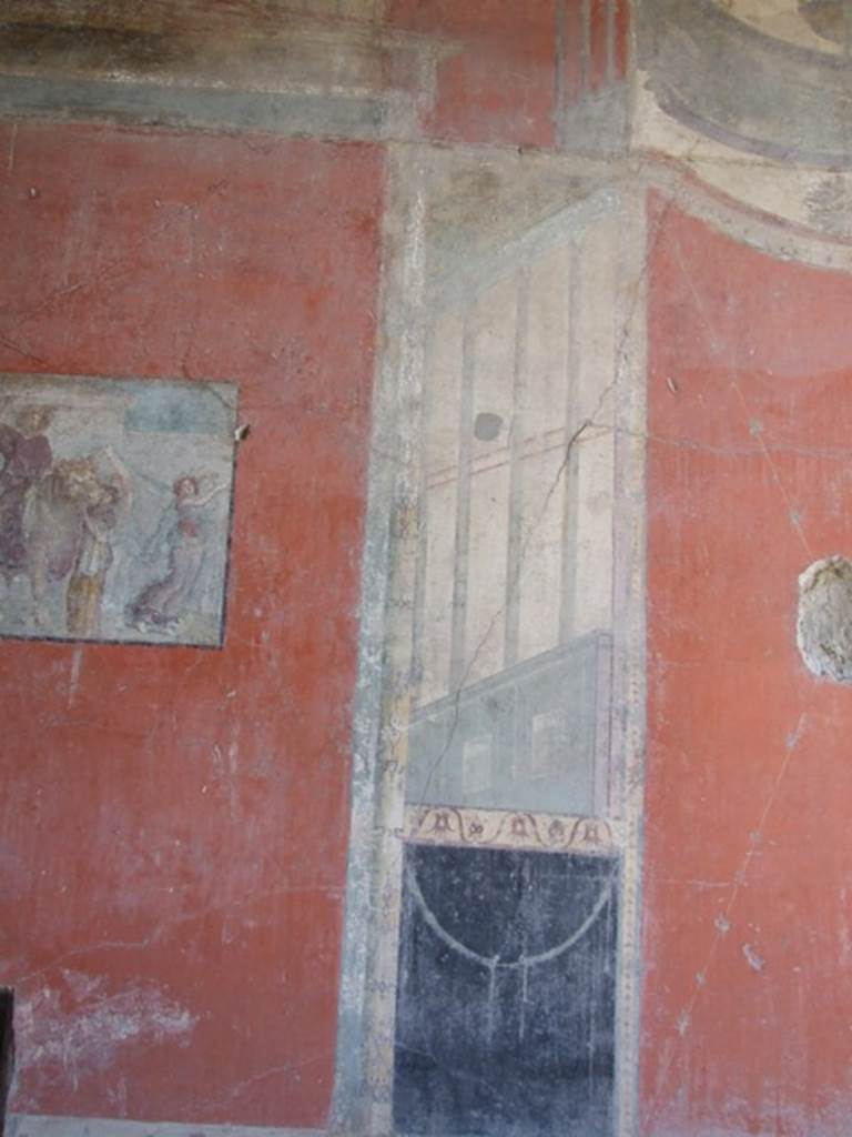 I.8.9 Pompeii.  March 2009. Room 7. Triclinium.  East wall. Lower level.  Architectural painting at south side of central panel.