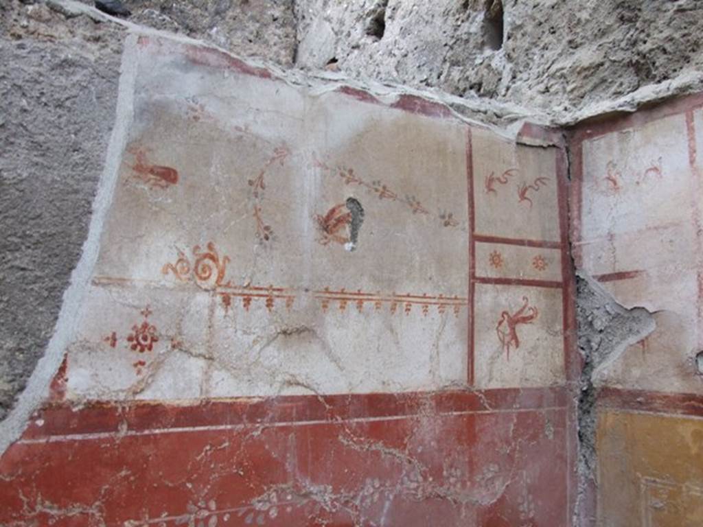 I.8.14 Pompeii. December 2007. Room 9, west wall and north-west corner, with detail of painted plaster.
