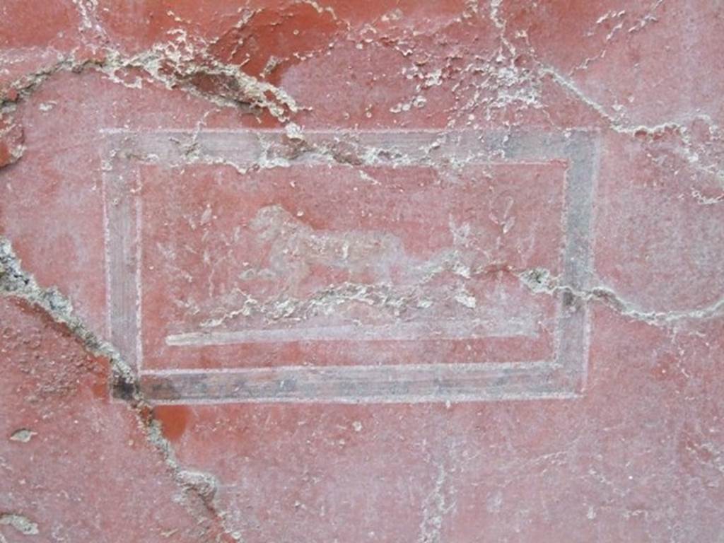 I.8.14 Pompeii. December 2007. Room 9, west wall with detail of painted panel of a lion.