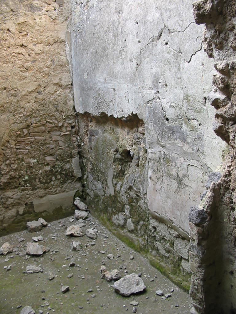I.8.15 Pompeii. May 2003. 
Looking towards north-east corner and remains of bed recess in east wall. Photo courtesy of Nicolas Monteix.