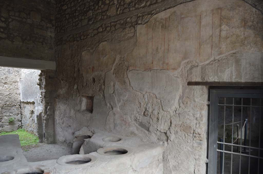 I.8.15 Pompeii. October 2017. Looking north along east wall of shop-room.
Foto Taylor Lauritsen, ERC Grant 681269 DÉCOR.