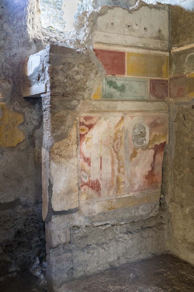 I.8.17 Pompeii. December 2021. 
Room 15. West wall of alcove. Photo courtesy of Johannes Eber.