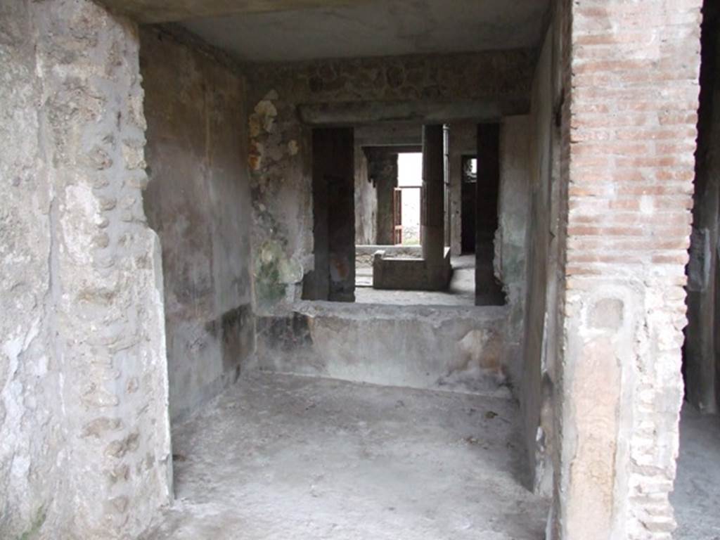 I.8.17 Pompeii. December 2007. Room 16. Room on south-west side of peristyle 17. 
Looking west through to atrium 3.