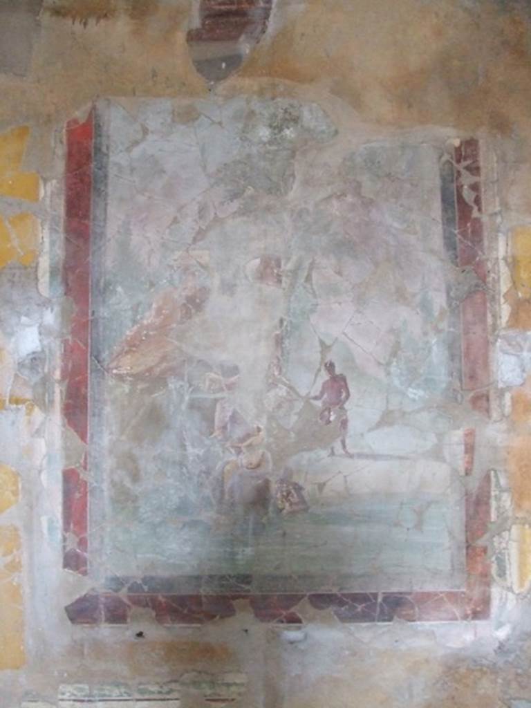 I.8.17 Pompeii. December 2007. Room 18, west wall, centre. 
Wall painting of Pan and the nymphs. According to Peters, this painting was reassembled from fragments, and a few pieces in the centre are still missing. The foreground was a stretch of water, in the centre was a tree with a column, against the tree a votive tablet had been placed.
Left of centre was a rock, two nymphs were sitting against the rock. They each held a jug, from which water was pouring. Pan was standing on the flat ground to the right of centre. See Peters, W.J.T. (1963): Landscape in Romano-Campanian Mural Paintings.The Netherland, Van Gorcum & Comp. (p.89)
