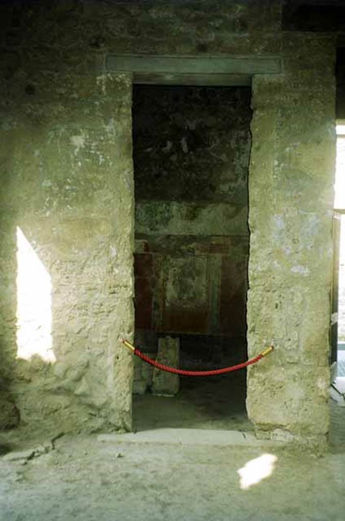 I.8.17 Pompeii. June 2010. Doorway to room 4, on south side of entrance corridor. Looking west. Photo courtesy of Rick Bauer.
