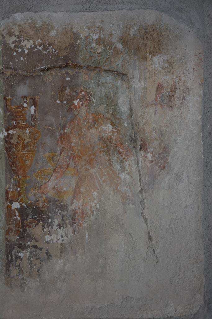 I.8.17 Pompeii. March 2019. 
Room 9, detail of figure from west side of central wall painting on north wall.
Foto Annette Haug, ERC Grant 681269 DÉCOR.