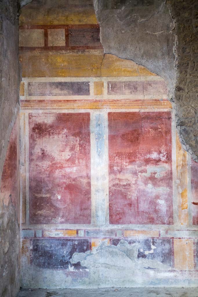 I.8.17 Pompeii. December 2021. 
Room 13, detail of west end of north wall. Photo courtesy of Johannes Eber.