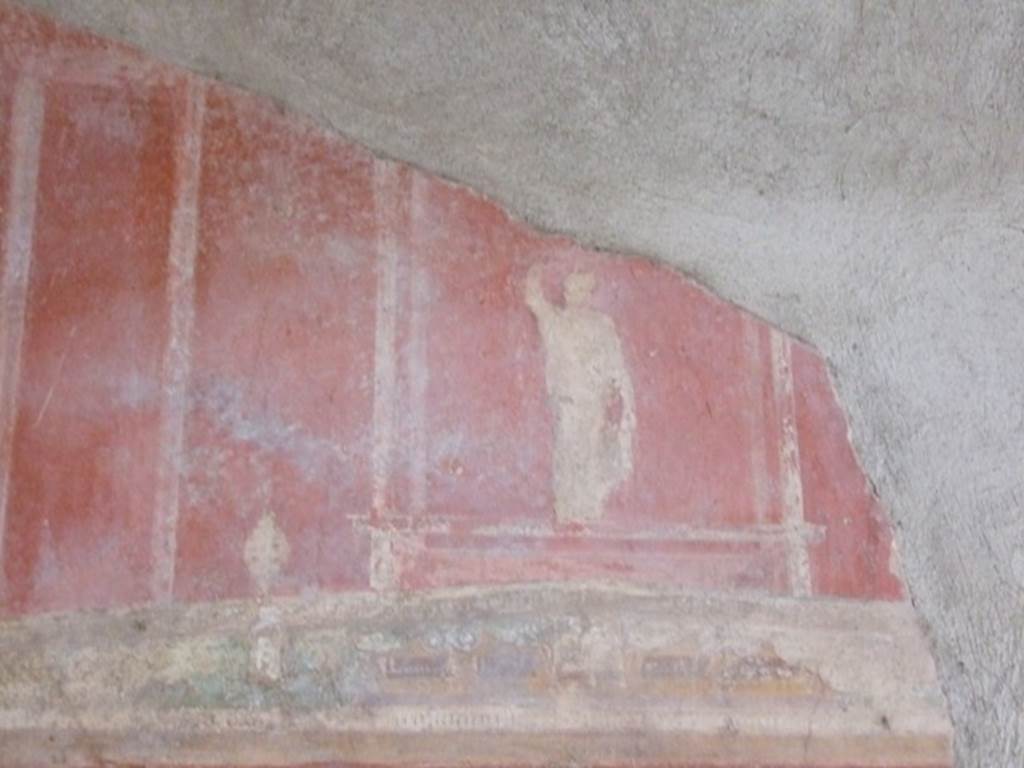 I.9.1 Pompeii. March 2009. Room 11, painted figure on south wall above central painting.